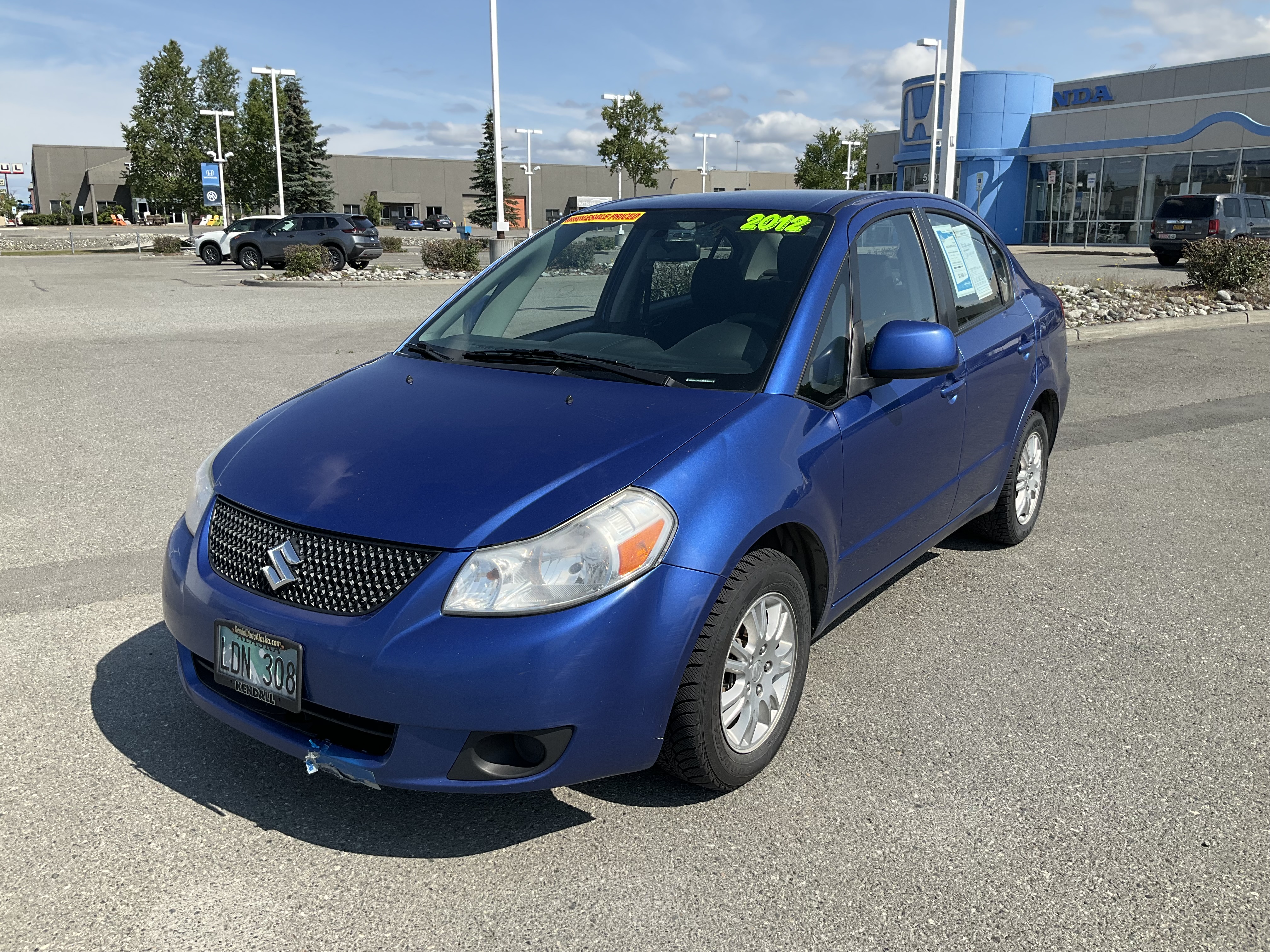Used 2012 Suzuki SX4 Sedan LE with VIN JS2YC5A31C6303666 for sale in Anchorage, AK