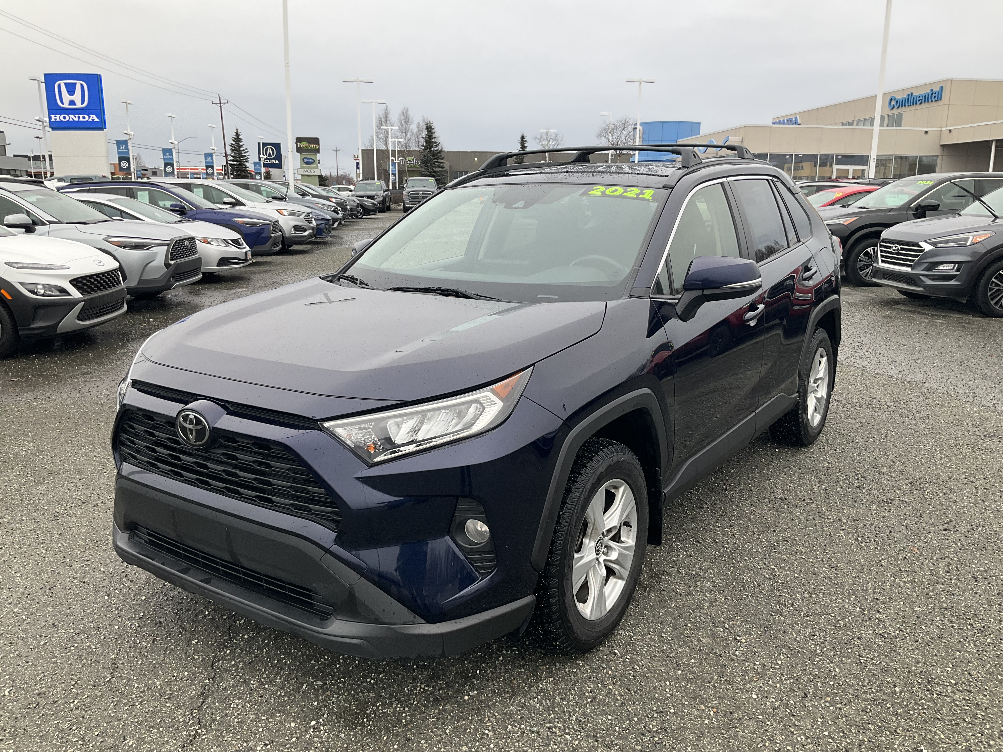 Used 2021 Toyota RAV4 XLE with VIN JTMP1RFV9MD073028 for sale in Anchorage, AK